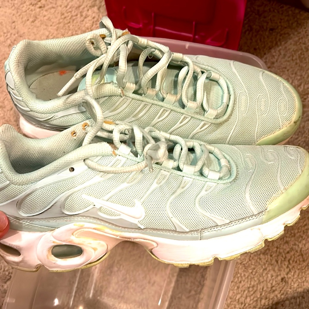 Mint green low top Nikes